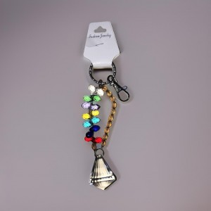 علاقة مفاتيح خرز مع سترص ملون
