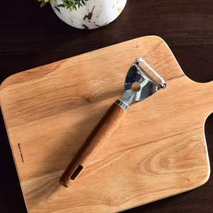 قشارة بطاطا ستانليس وجه ضاحك يد خشب عريض