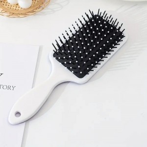 مشاطة بلاستيك عريضه يد مبسطة ملون