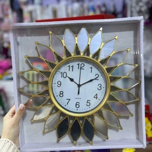 ساعة ارقام اطار مدور شمس ذهبي مع زجاج كريستال اكريلك