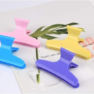 مشابك شعر بلاستيك سادة 12 قطعة الوان