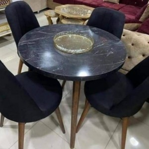 طاولة سفرة خشب مدورة مع 4 كراسي 