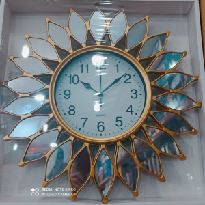 ساعة ارقام اطار مدور شمس ذهبي مع زجاج كريستال اكريلك