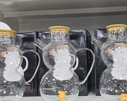 ابريق زيت زجاج دائرتين فوق بعض ويد مع غطاء خشبي