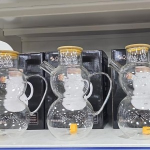 ابريق زيت زجاج دائرتين فوق بعض ويد مع غطاء خشبي