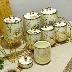 طقم سكريات بهارات بورسلان ابيض كتابة عربية ستاند ذهبي 7 قطع طقم سكريات بهارات بورسلان ابيض كتابة عربية ستاند ذهبي 7 قطع