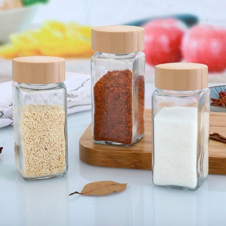 علب بهارات زجاج مع غطاء خشب بامبو