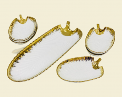 طقم صحون بورسلان شكل ورقة شجر لون ابيض حيف ذهبي 7 قطع