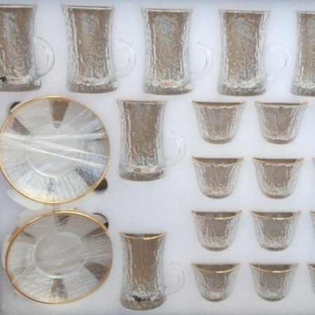 طقم كاسات شاي وفناجين قهوه مع استكانات زجاج محزز مع حيف ذهبي 36 قطعه طقم كاسات شاي وفناجين قهوه مع استكانات زجاج محزز مع حيف ذهبي 36 قطعه