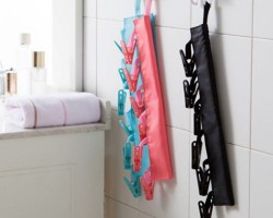 منشر غسيل صغير مع ملاقط للغيارات 