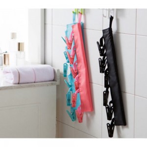 منشر غسيل صغير مع ملاقط للغيارات 