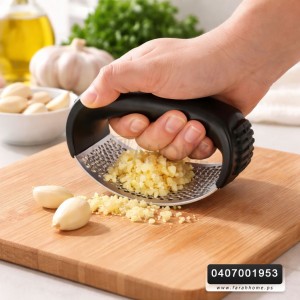 هراسة ثوم ستانلس مع مقبض بلاستيك