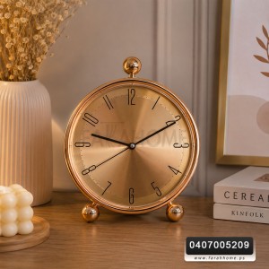 ساعة دائرية بلاستيك لون برونزي  قاعدة كرة 28سم 