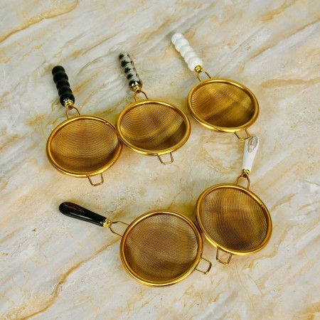 مصفاة شاي ذهبي يد سيراميك