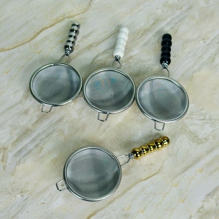 مصفاة شاي ذهبي يد سيراميك