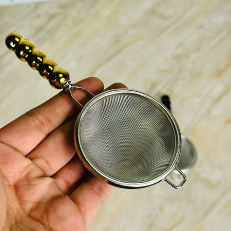 مصفاة شاي ذهبي يد سيراميك